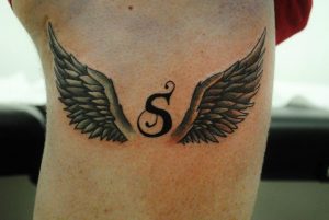 181 Tattooz Studio  Initial S with a Crown and heart in which heart is  coloured in red which makes it colorfulfor more such initials tattoo or letter  tattoo visit our studio 