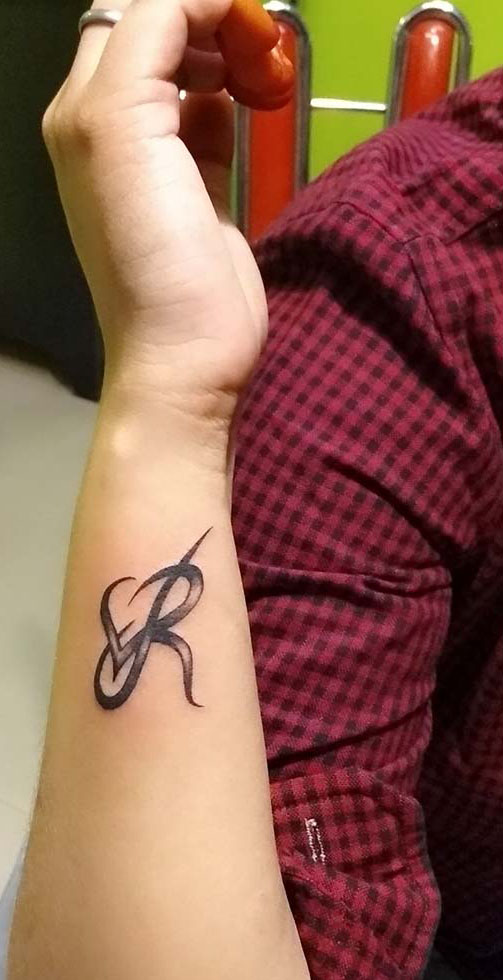 Letter R Tattoo Design 42 on forearm