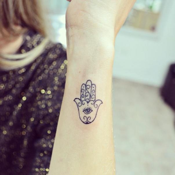 Small Hamsa tattoo on the wrist