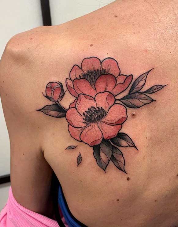 Shoulder blade tattoo of a lotus flower by tattoo