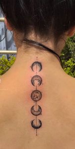 moon cycle spiral tattoo