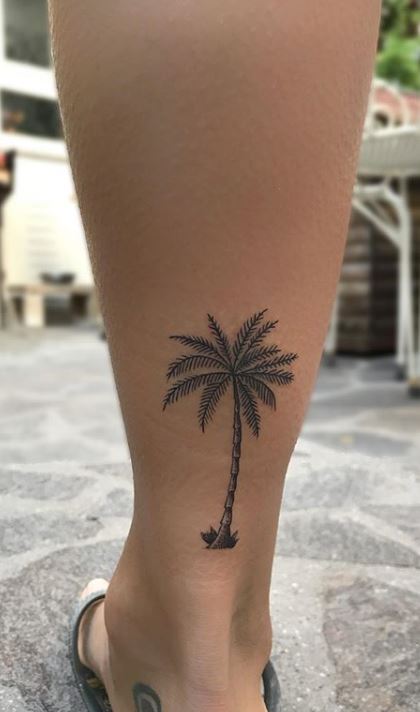 Single needle palm tree tattoo on the ankle