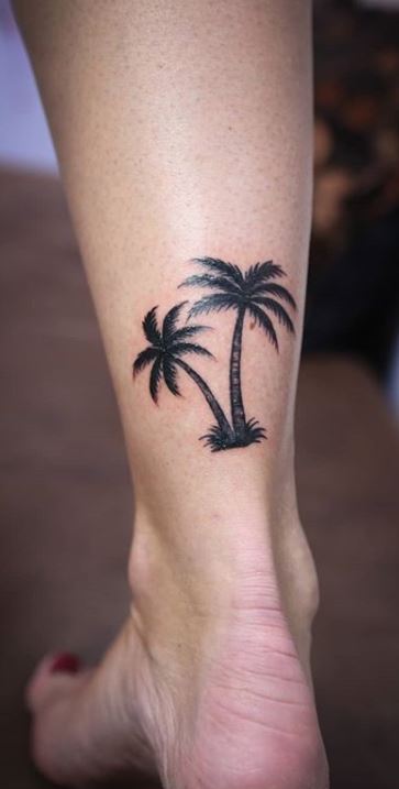 palm tree tattoo tatouage wave vague tattoo cocotier by KevinRoss  wwwtimillafr  Palm tattoos Tree tattoo ankle Palm tree tattoo ankle