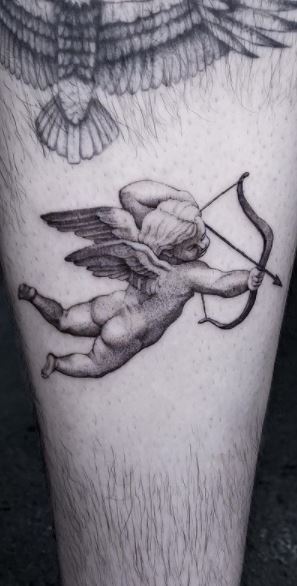 Cherub Angel With Gun Tattoo On Back Shoulder