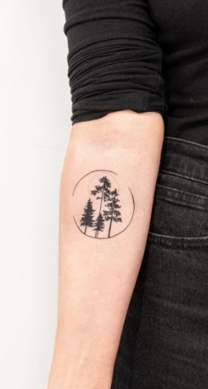 Tree tattoo on the right bicep