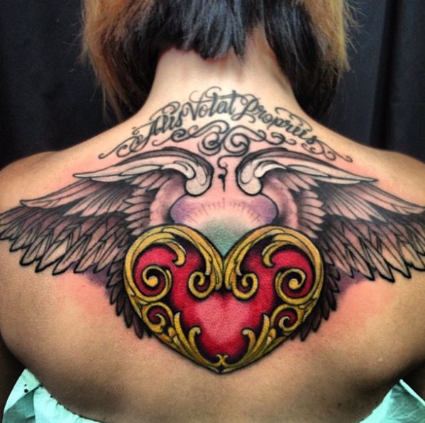 Traditional Tattoo Of A Flying Heart With Flowers And Banner  Free Stock  Images  Photos  256951760  StockFreeImagescom