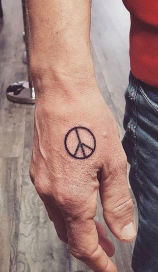 Peace Tattoo On Wrist - Tattoos Designs