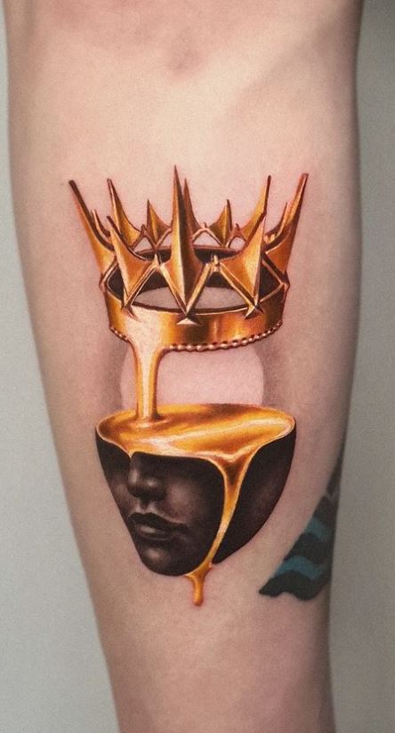 Crown tattoo.