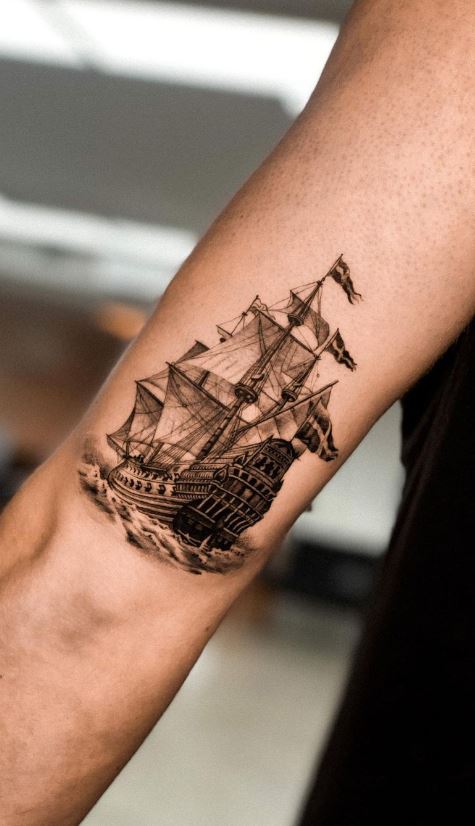 Small ship tattoo on female sailor ankle Stock Photo  Alamy